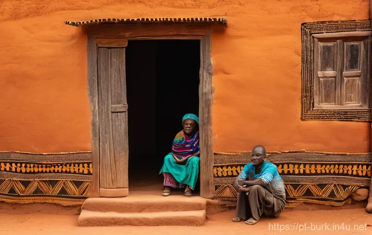 부르키나파소의 전통 가옥 및 건축 양식 - **Prompt:** A wide-angle, aerial perspective of a traditional Kassena village in Burkina Faso, showc...