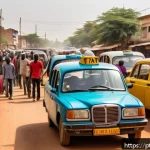 부르키나파소 현지 교통 수단 및 이동 방법 - A bustling urban street scene in Ouagadougou, Burkina Faso, featuring several colorful shared taxis ...